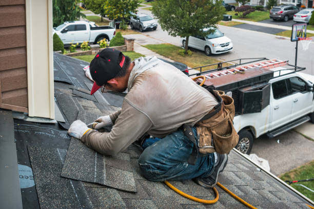 Professional Roofing technician working in Armbrust, PA